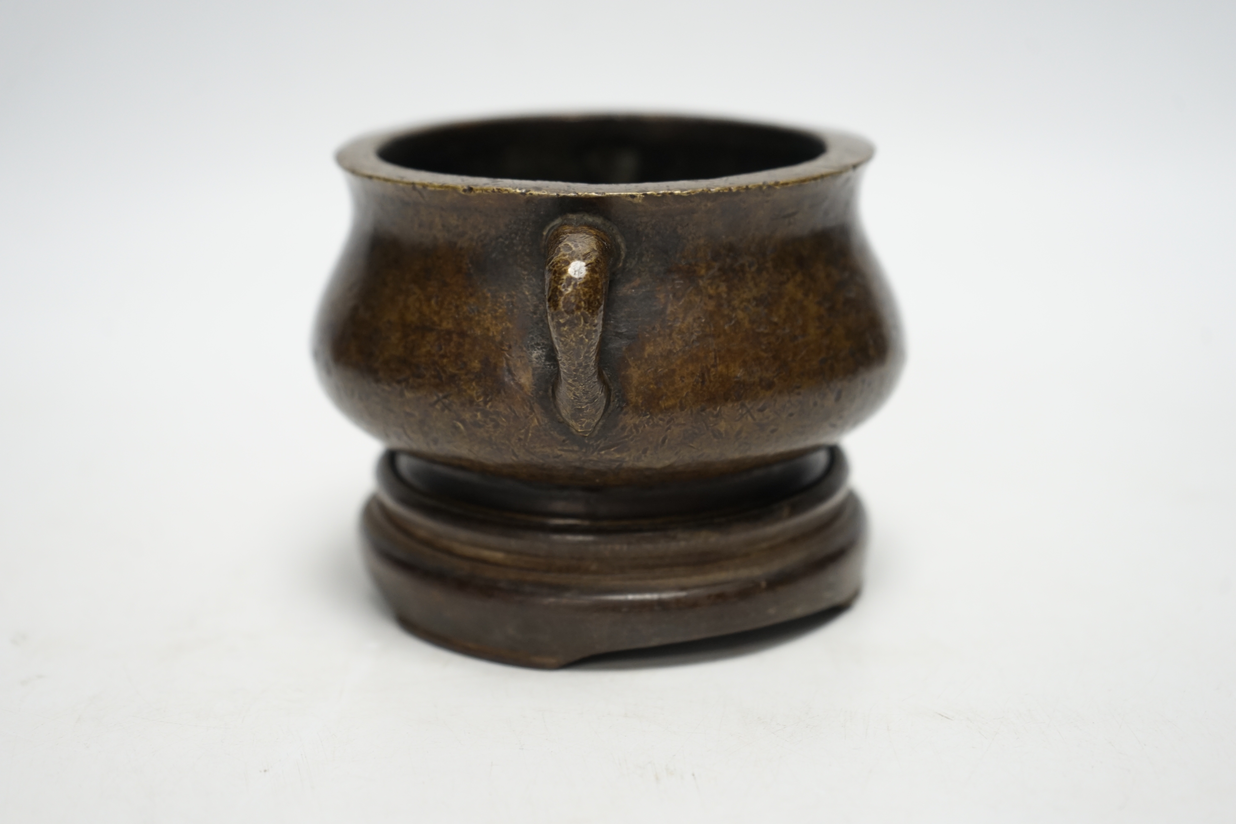 A Chinese bronze censer, Xuande mark, on plinth, 8cm